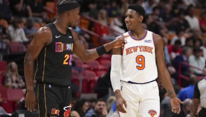  巴特勒三双热火加时险胜尼克斯  